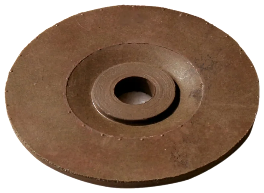 A KRAFLEX Rubberized disc seen face on, showing the raised centre hub