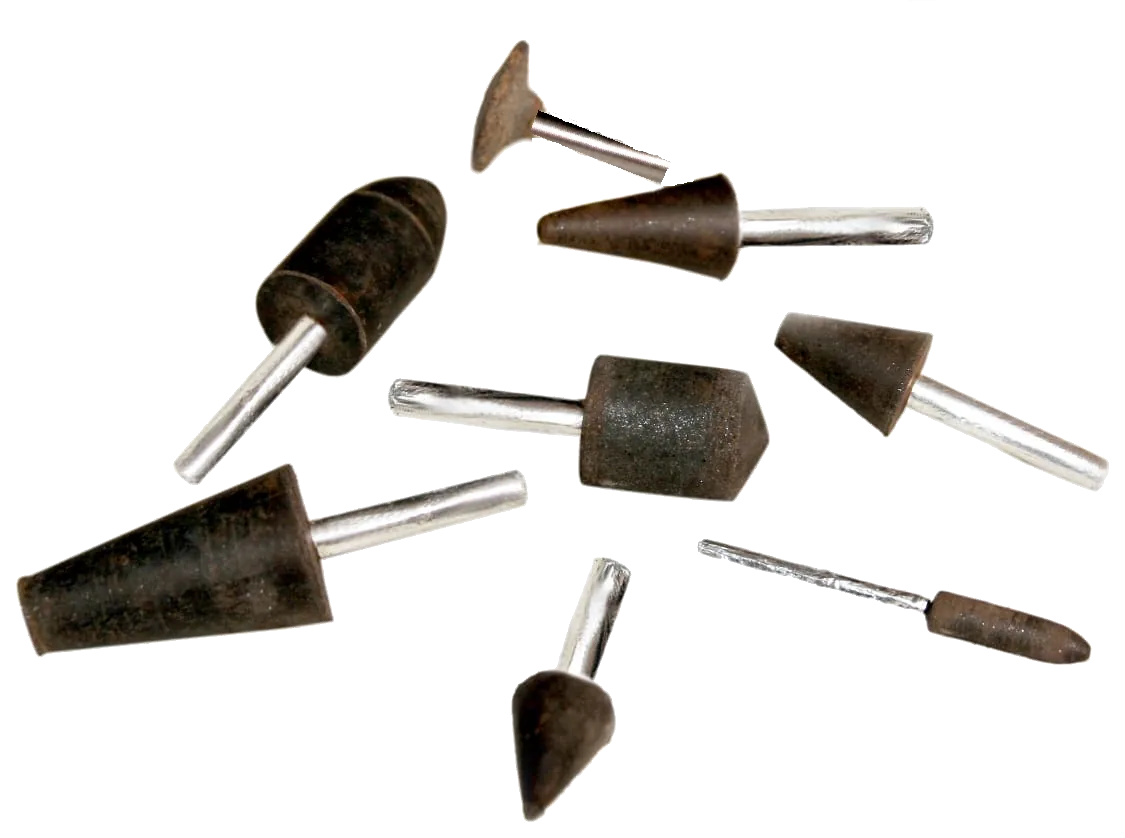 An assortment of kraflex mounted points - cones, cylinders and tapers on steel stems